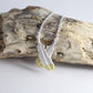 Little Taonga - Crossed Huia Feather Necklace (Silver)